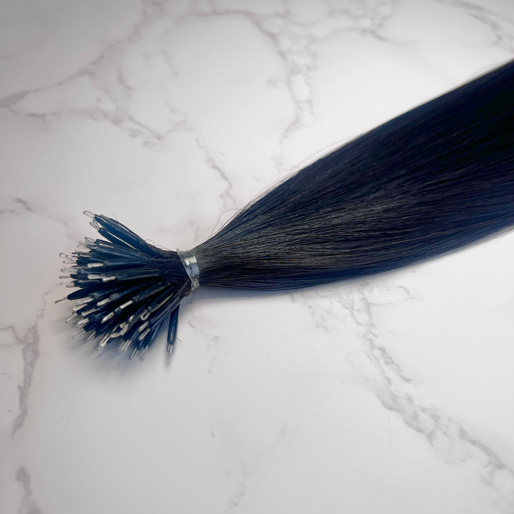 Human Hair Extensions. Natural Black