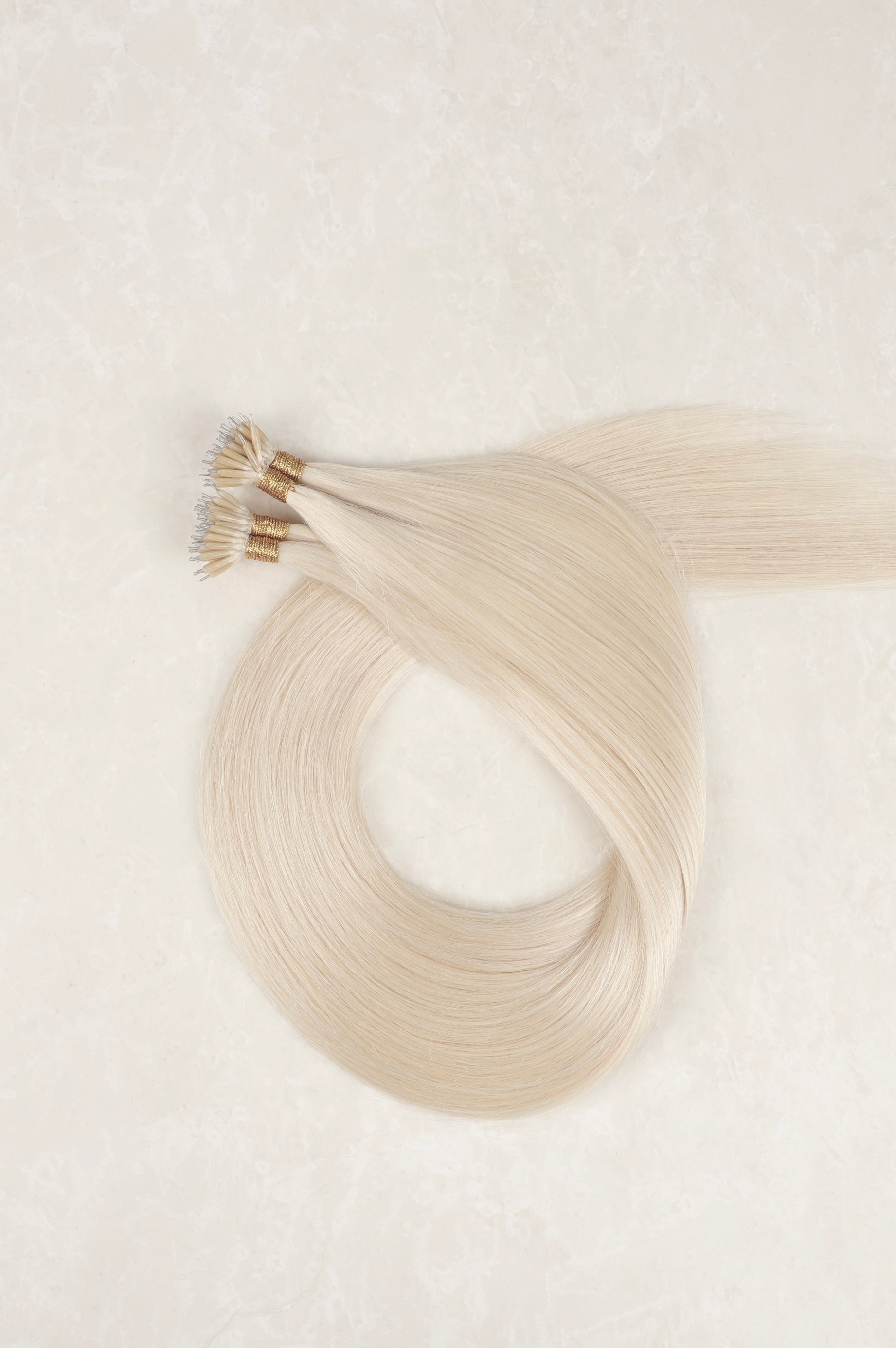 Human Hair Extensions. White Blonde
