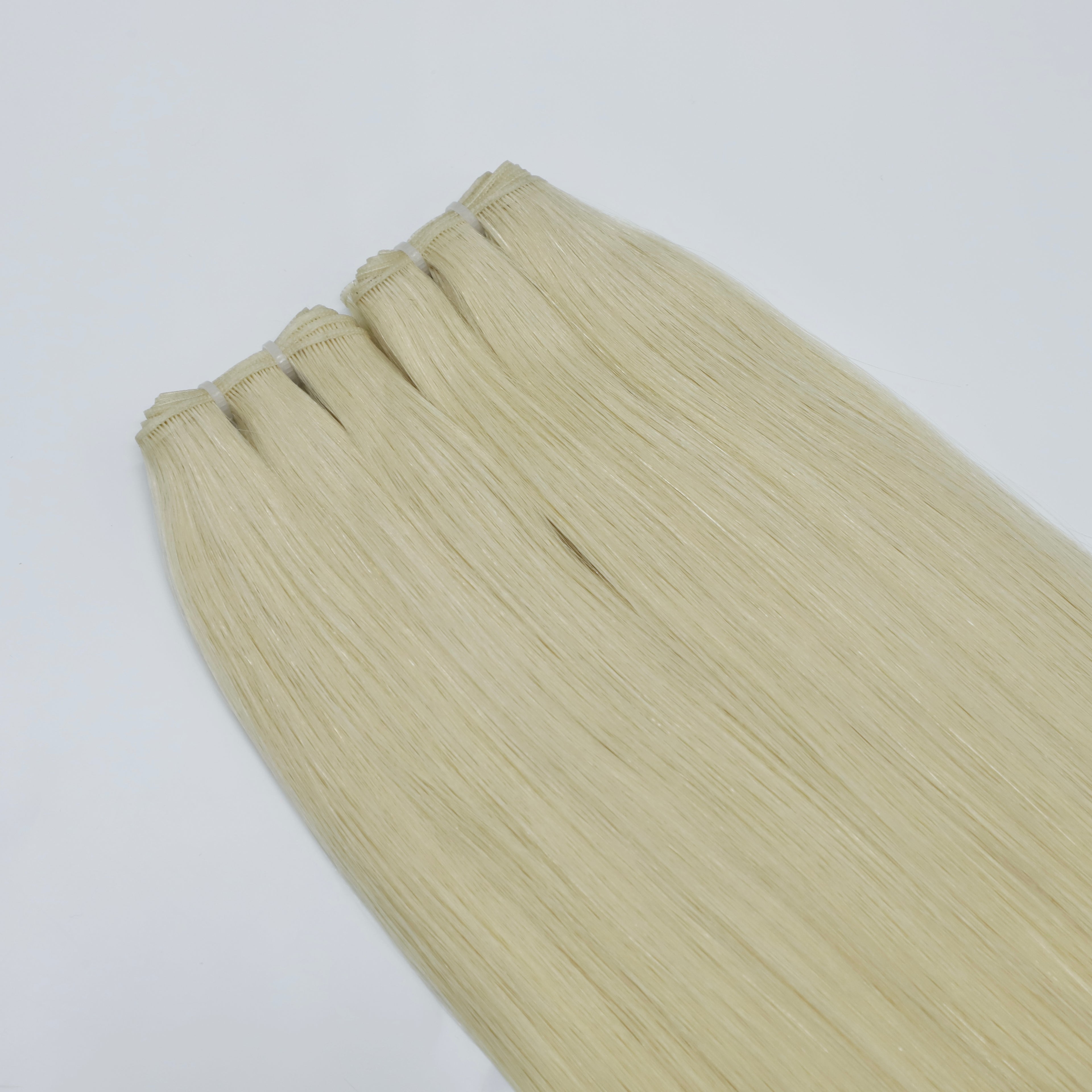 Human Hair Extensions. Platinum Blonde