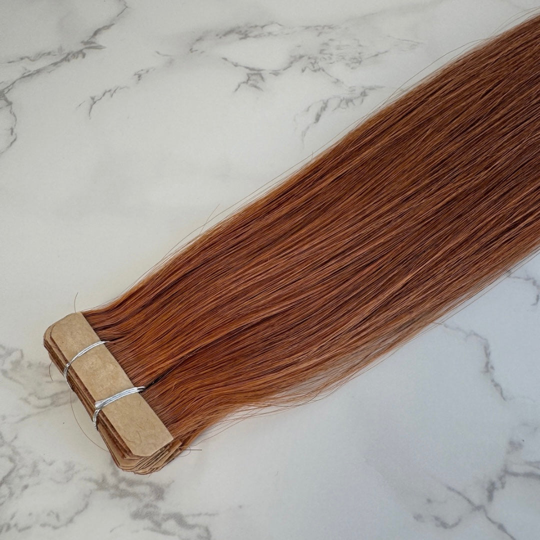 Human Hair Extensions. Copper