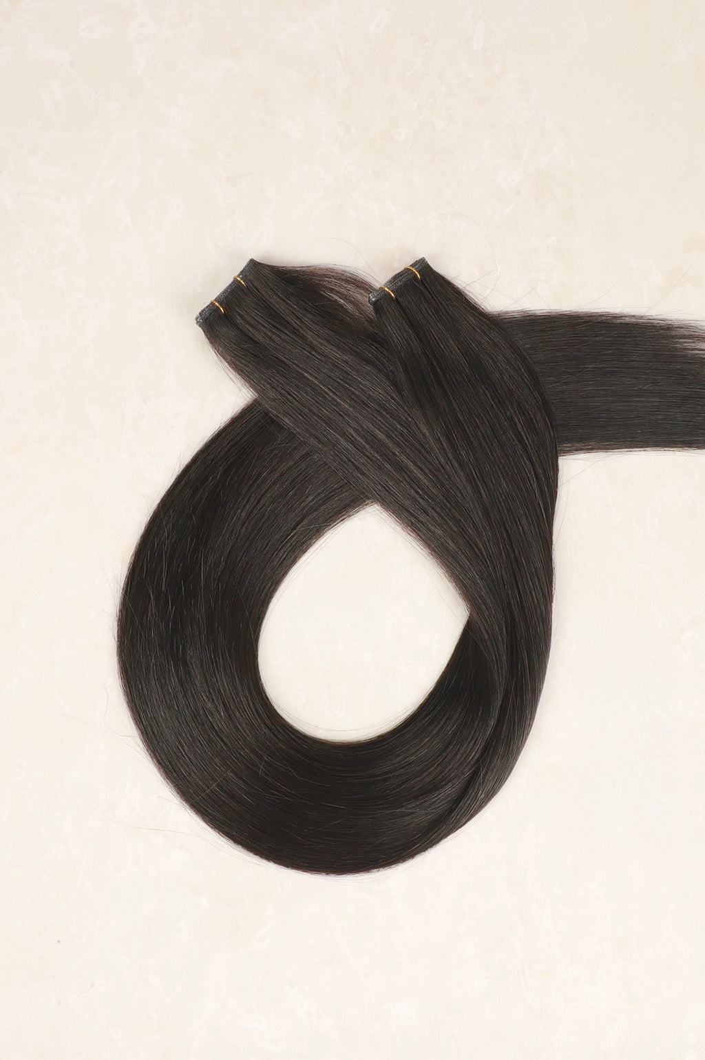 Human Hair Extensions. Natural Black
