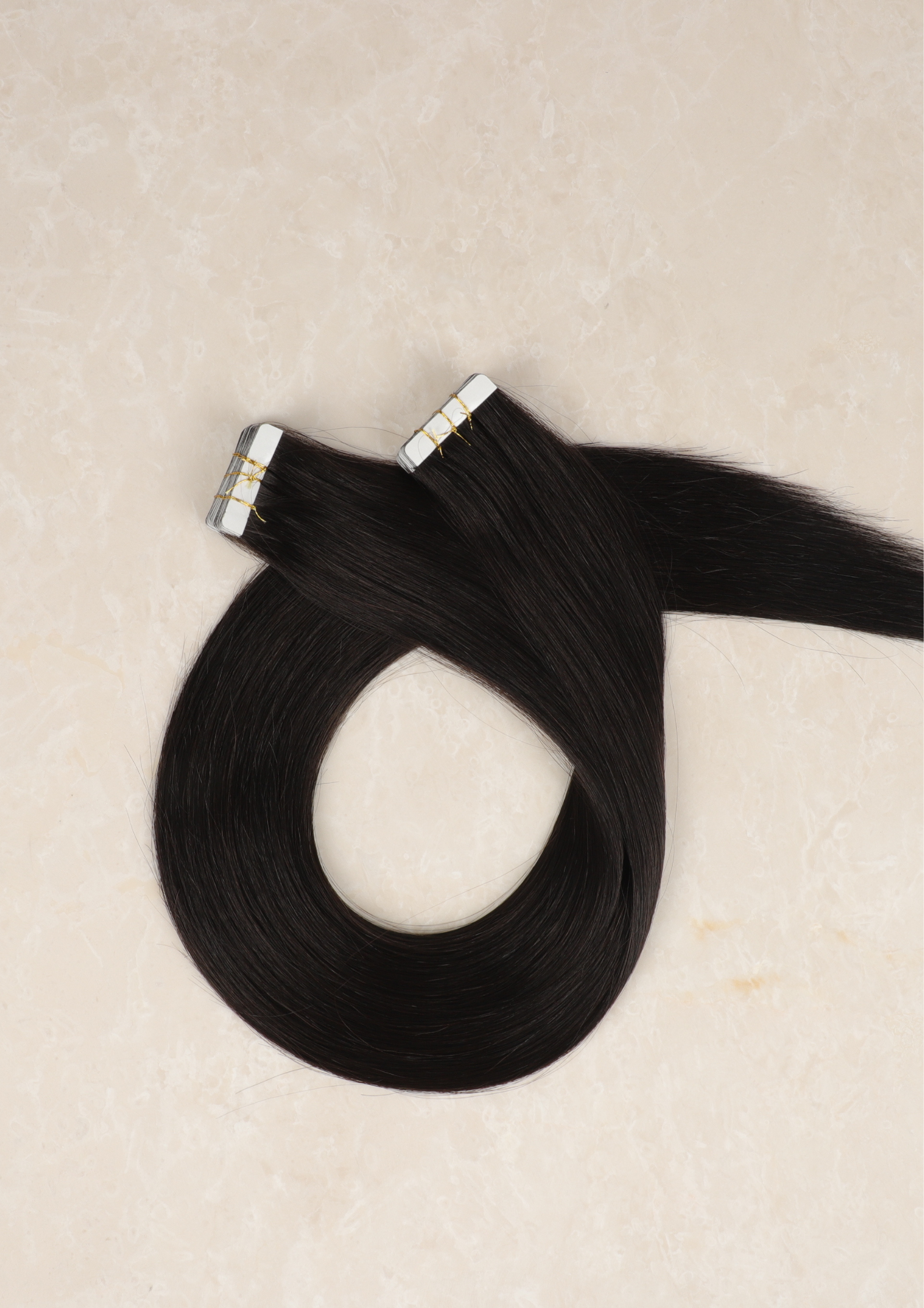 Human Hair Extensions. Natural Black