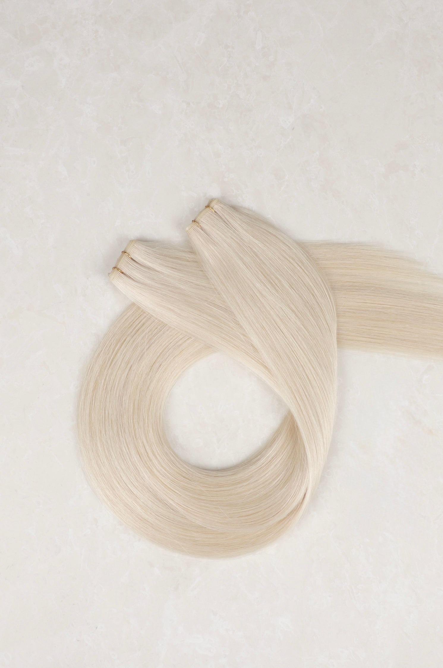 Human Hair Extensions. White Blonde