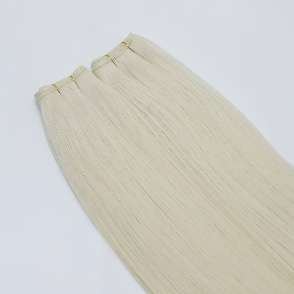 Human Hair Extensions. White Blonde
