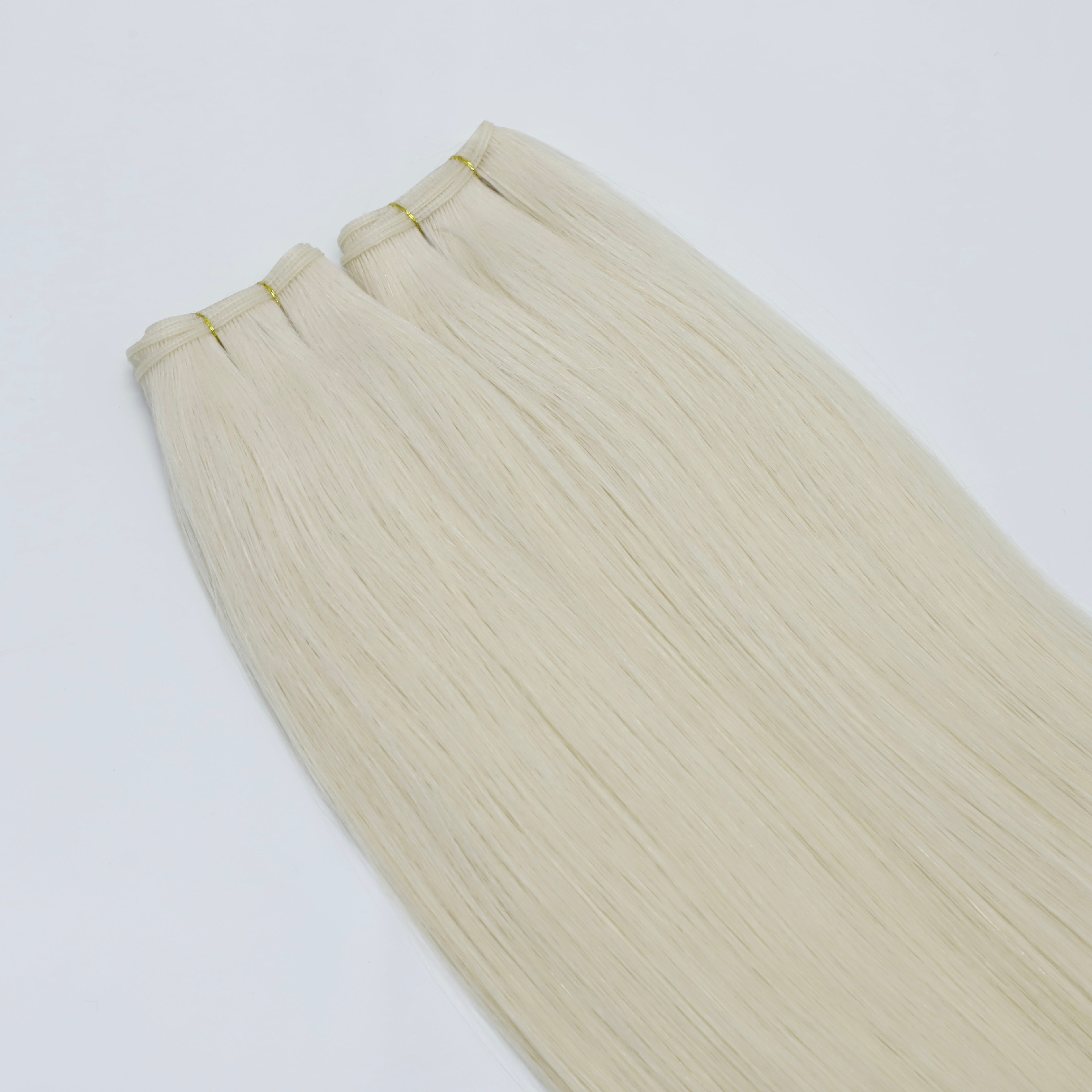 Human Hair Extensions. White Blonde