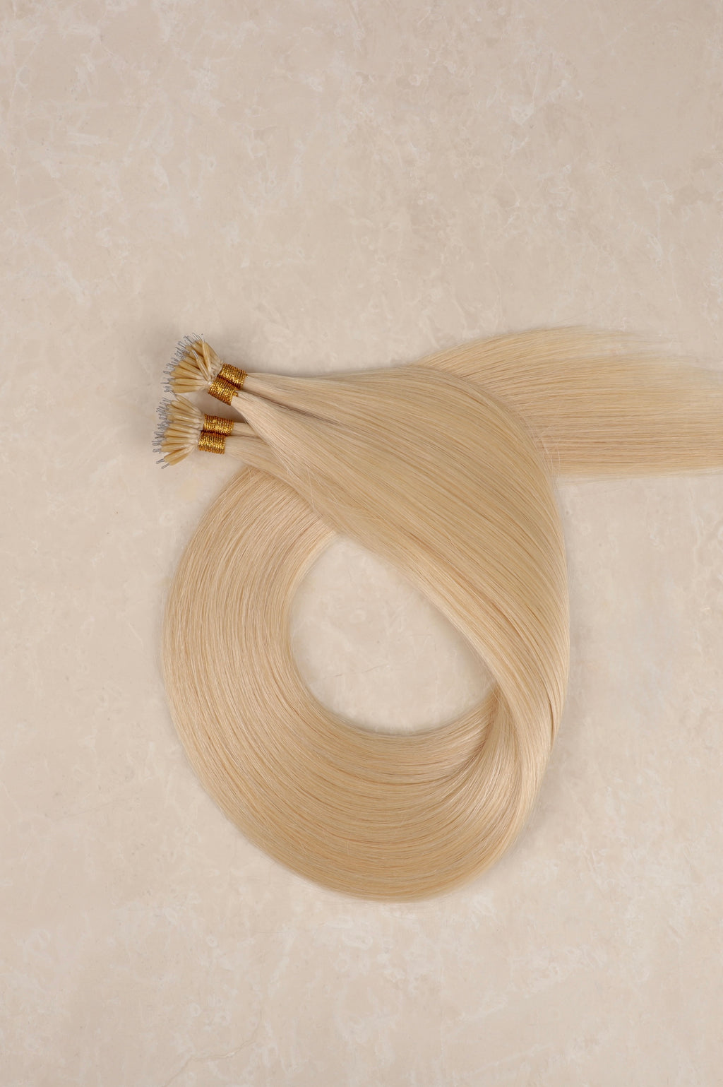 Human Hair Extensions. Champagne Blonde