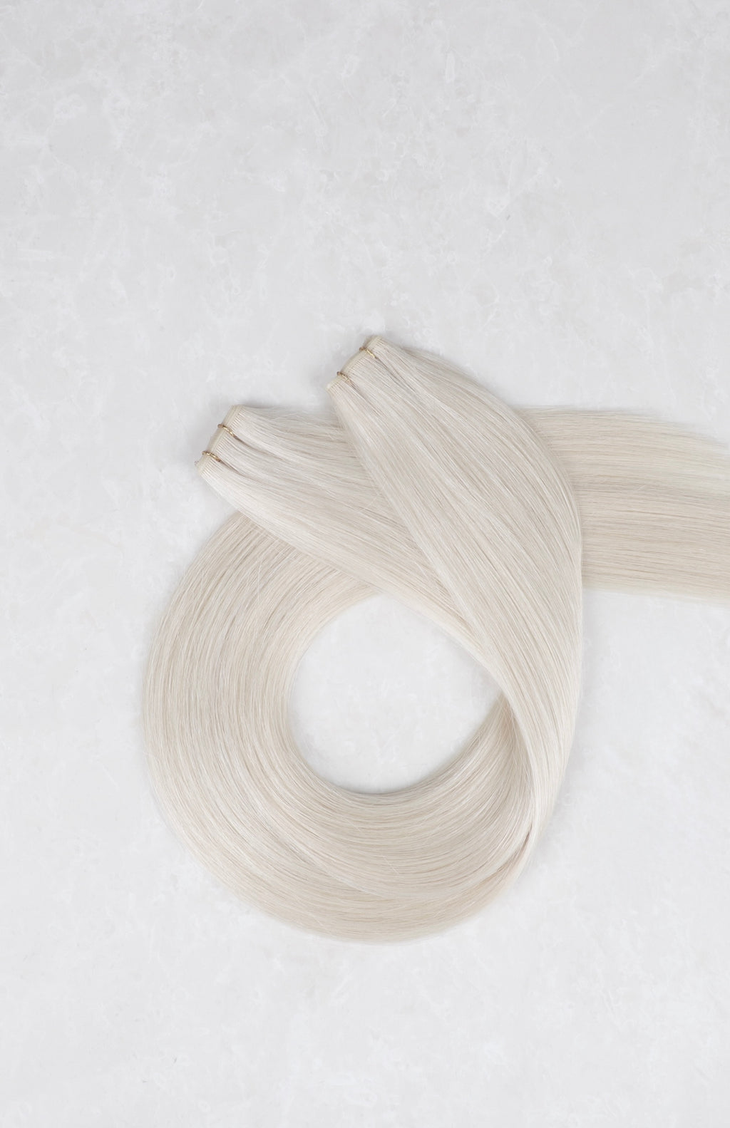 Human Hair Extensions. Light Silver